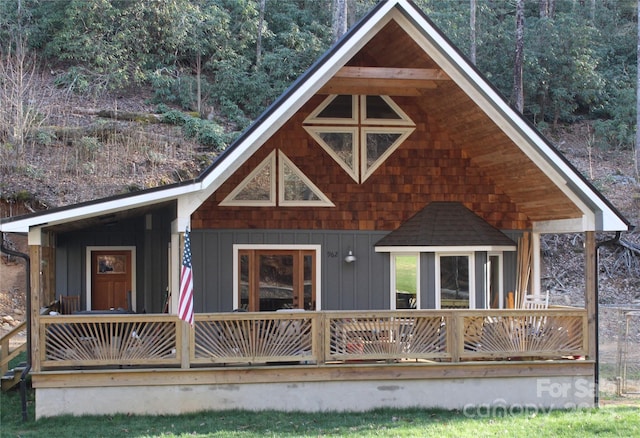 962 Laurel Mountain View Rd, Flat Rock, NC 28731 - view of front of home with board and batten siding and covered porch