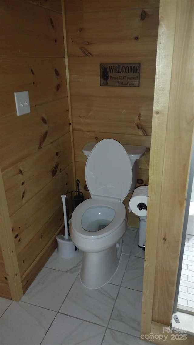 962 Laurel Mountain View Rd, Flat Rock, NC 28731 - bathroom featuring wood walls and toilet