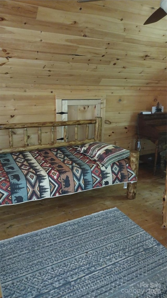 962 Laurel Mountain View Rd, Flat Rock, NC 28731 - bedroom featuring wood walls, wood finished floors, and wood ceiling