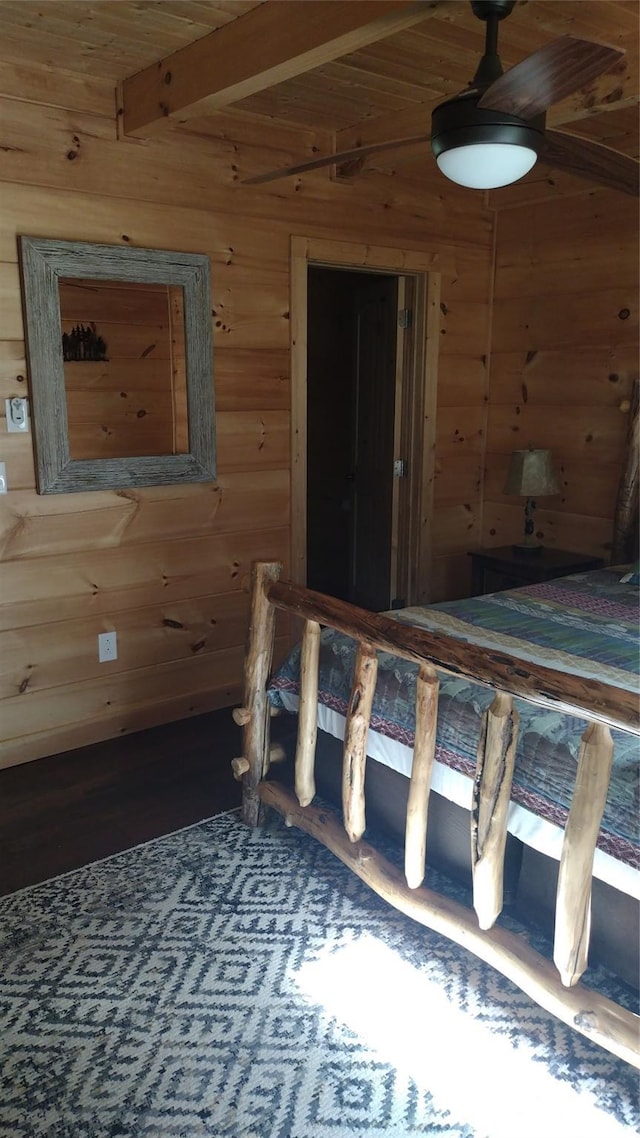 962 Laurel Mountain View Rd, Flat Rock, NC 28731 - bedroom with beamed ceiling, wood walls, and wood finished floors