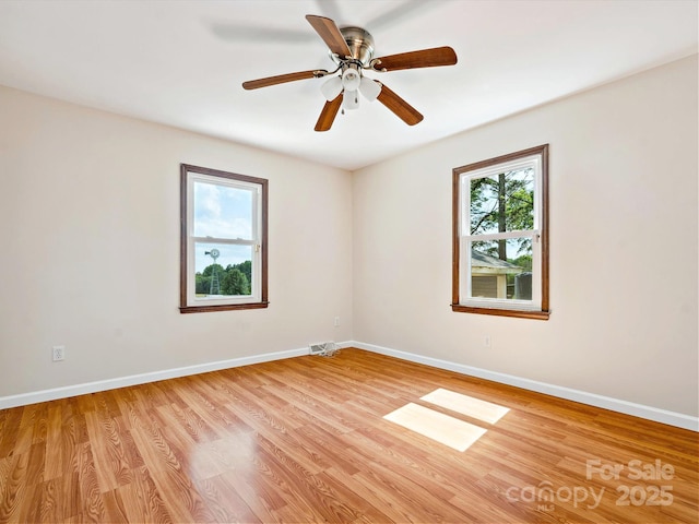 5632 Zion Church Rd, Concord, NC 28025 - spare room with plenty of natural light, light wood-style floors, and a ceiling fan