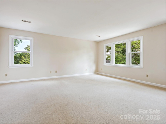5632 Zion Church Rd, Concord, NC 28025 - unfurnished room with healthy amount of natural light and light colored carpet