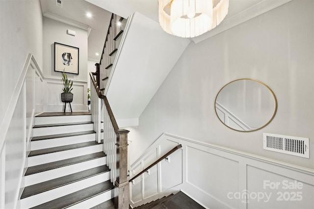 622 Mattie Rose Ln, Charlotte, NC 28204 - stairway with a decorative wall and wainscoting