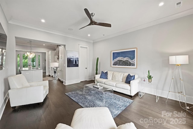 622 Mattie Rose Ln, Charlotte, NC 28204 - living room featuring dark wood-type flooring, crown molding, a ceiling fan, and recessed lighting