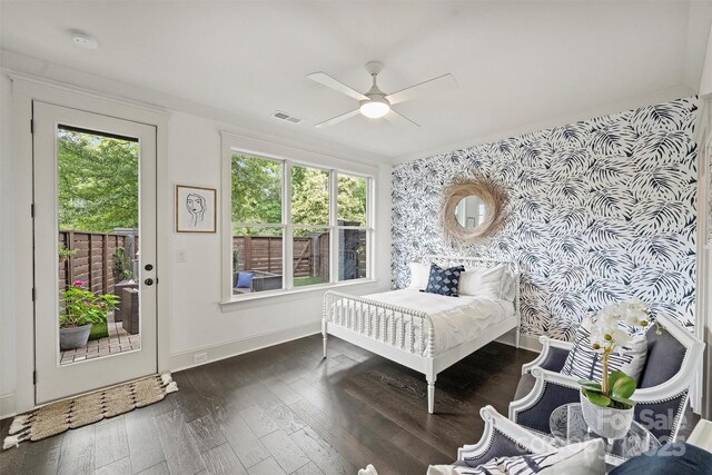 622 Mattie Rose Ln, Charlotte, NC 28204 - bedroom with wallpapered walls, access to outside, an accent wall, wood finished floors, and ceiling fan