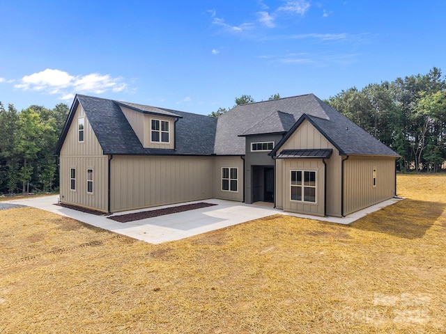 5507 NC-218 Hwy, Peachland, NC 28133 - view of front of home with a patio area, a shingled roof, and a front yard