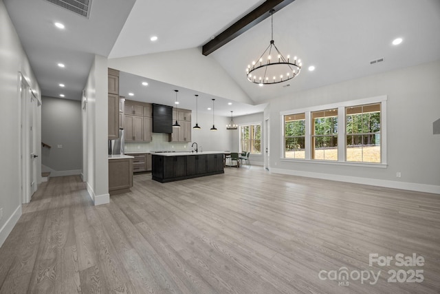 5507 NC-218 Hwy, Peachland, NC 28133 - unfurnished living room with a chandelier, light wood finished floors, and recessed lighting