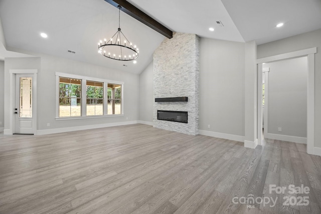 5507 NC-218 Hwy, Peachland, NC 28133 - unfurnished living room featuring a chandelier, light wood finished floors, a fireplace, and recessed lighting