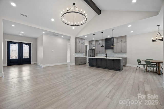 5507 NC-218 Hwy, Peachland, NC 28133 - living area with a chandelier, recessed lighting, light wood-style flooring, beamed ceiling, and high vaulted ceiling