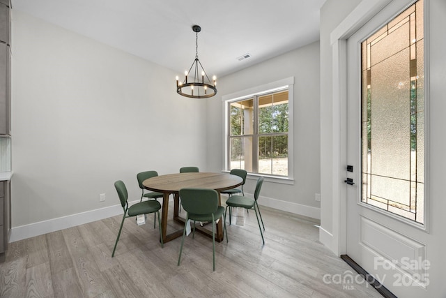 5507 NC-218 Hwy, Peachland, NC 28133 - dining space featuring a chandelier and light wood-type flooring