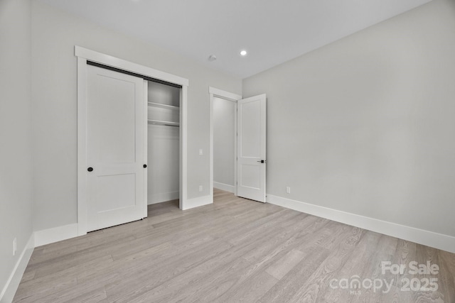 5507 NC-218 Hwy, Peachland, NC 28133 - unfurnished bedroom with wood finished floors, a closet, and recessed lighting