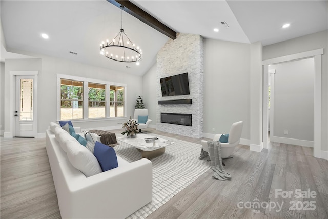 5507 NC-218 Hwy, Peachland, NC 28133 - living area with a stone fireplace, a chandelier, wood finished floors, and recessed lighting
