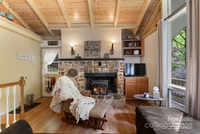80 Laurel Canyon Rd, Franklin, NC 28734 - living room with plenty of natural light, wood finished floors, a stone fireplace, and wood ceiling