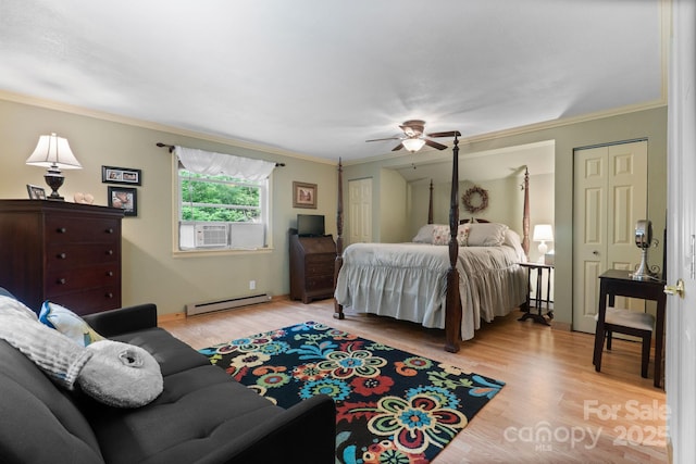 80 Laurel Canyon Rd, Franklin, NC 28734 - bedroom featuring a baseboard radiator, light wood-style floors, crown molding, cooling unit, and a ceiling fan