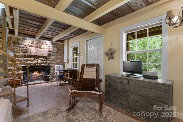 80 Laurel Canyon Rd, Franklin, NC 28734 - sitting room with a wood ceiling with exposed beams, a fireplace, tile patterned floors, and a desk