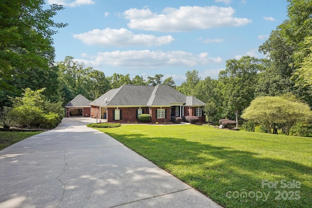 7612 Maple Bluff Ln, Concord, NC 28025 - view of front of house with a front yard, concrete driveway, and brick siding