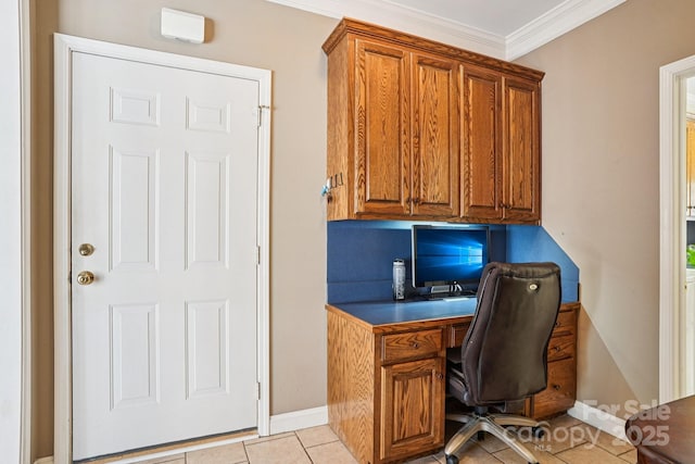 7612 Maple Bluff Ln, Concord, NC 28025 - home office with light tile patterned floors, ornamental molding, and built in study area