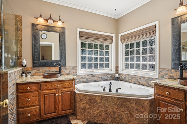 7612 Maple Bluff Ln, Concord, NC 28025 - bathroom featuring two vanities, a bath, and ornamental molding