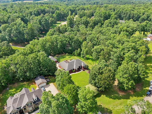 7612 Maple Bluff Ln, Concord, NC 28025 - aerial view of property's location featuring a heavily wooded area and nearby suburban area