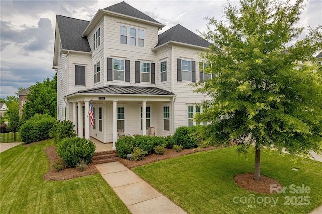 5256 Meadowcroft Way, Fort Mill, SC 29708 - victorian home with a porch, a standing seam roof, a front yard, and a metal roof