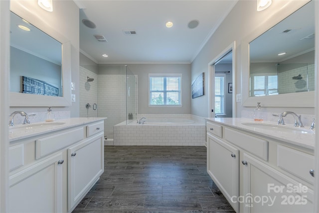 5256 Meadowcroft Way, Fort Mill, SC 29708 - bathroom with ornamental molding, tiled shower, two vanities, wood finished floors, and a bath