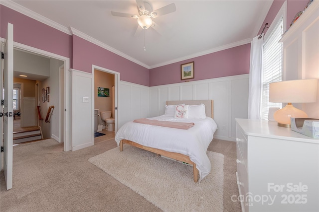 5256 Meadowcroft Way, Fort Mill, SC 29708 - bedroom with light carpet, crown molding, multiple windows, a decorative wall, and connected bathroom