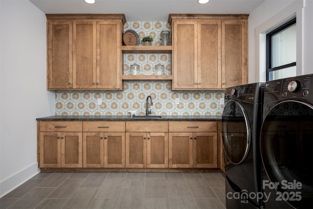 176 Windwood Ln, Troutman, NC 28166 - washroom with cabinet space, washing machine and clothes dryer, and recessed lighting