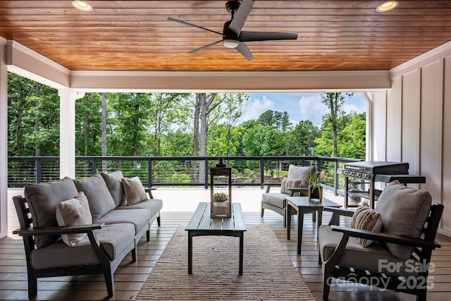 176 Windwood Ln, Troutman, NC 28166 - deck with an outdoor living space, a ceiling fan, and area for grilling