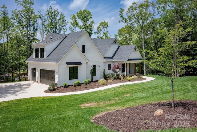 176 Windwood Ln, Troutman, NC 28166 - modern farmhouse with an attached garage, board and batten siding, roof with shingles, concrete driveway, and a front lawn
