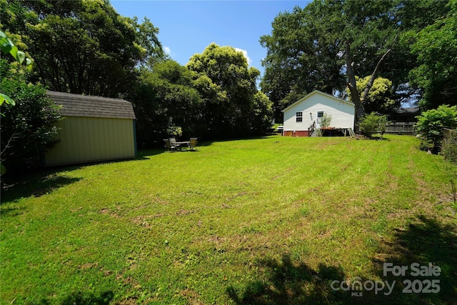 201 W 19th St, Kannapolis, NC 28081 - view of yard featuring a storage unit
