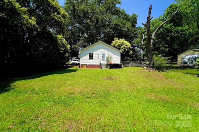 201 W 19th St, Kannapolis, NC 28081 - view of yard featuring view of wooded area