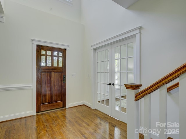 8508 Sandowne Ln, Huntersville, NC 28078 - foyer entrance with french doors, wood finished floors, and a high ceiling