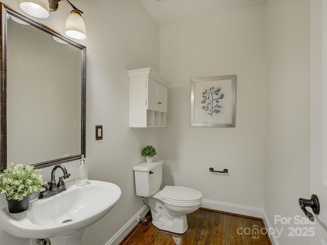 8508 Sandowne Ln, Huntersville, NC 28078 - bathroom featuring a sink and wood finished floors
