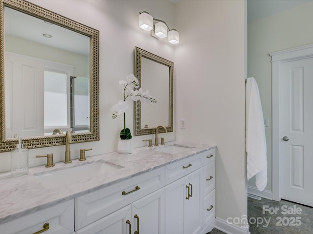 8508 Sandowne Ln, Huntersville, NC 28078 - bathroom featuring double vanity and baseboards