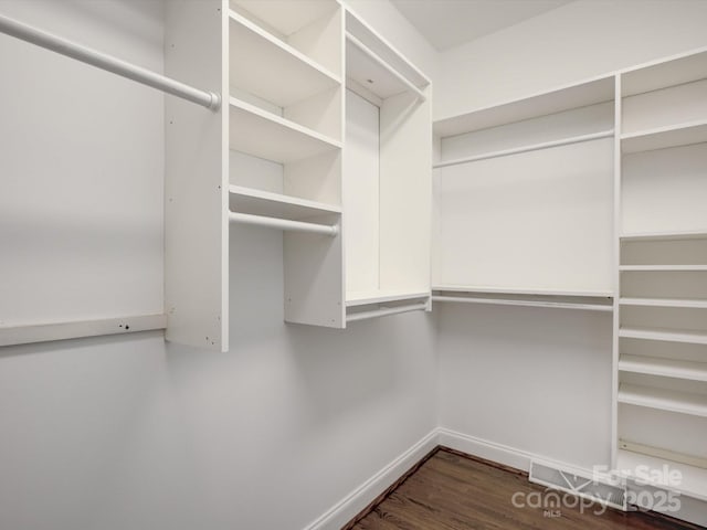 8508 Sandowne Ln, Huntersville, NC 28078 - walk in closet featuring wood finished floors