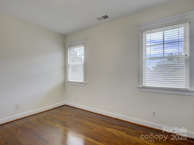 8508 Sandowne Ln, Huntersville, NC 28078 - spare room with baseboards and dark wood-style flooring