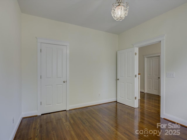 8508 Sandowne Ln, Huntersville, NC 28078 - empty room with a chandelier and wood finished floors