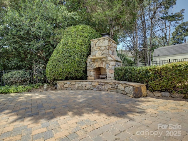8508 Sandowne Ln, Huntersville, NC 28078 - view of patio with an outdoor stone fireplace