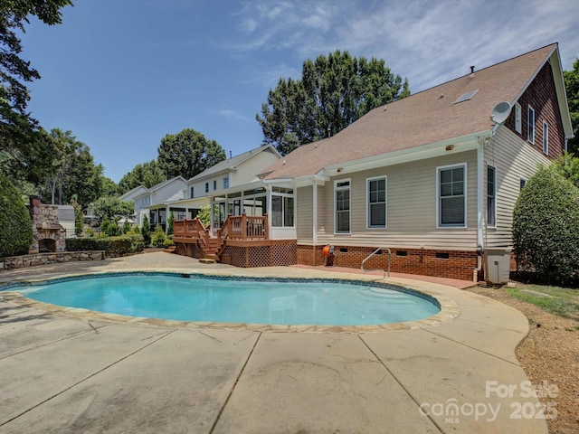 8508 Sandowne Ln, Huntersville, NC 28078 - swimming pool featuring a wooden deck, a sunroom, and a patio area