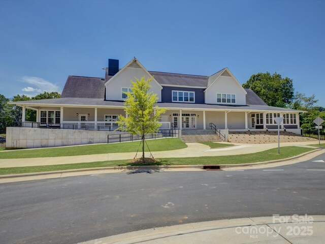 8508 Sandowne Ln, Huntersville, NC 28078 - country-style home with covered porch and a chimney