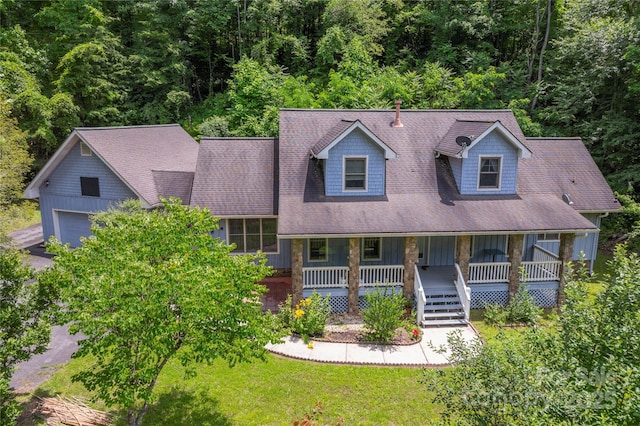 98 Choga Rdg, Whittier, NC 28789 - cape cod-style house with a porch, a wooded view, and roof with shingles
