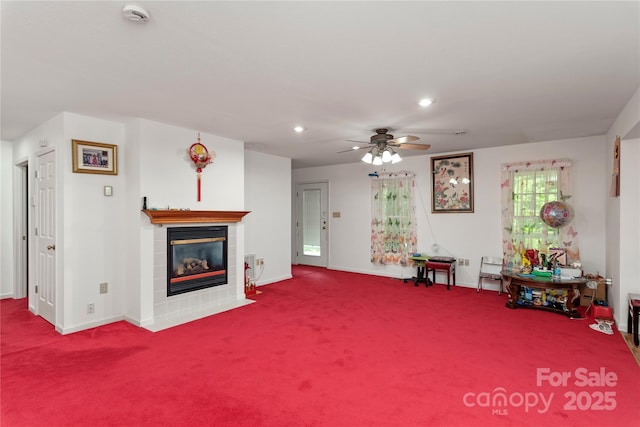 98 Choga Rdg, Whittier, NC 28789 - carpeted living room featuring a tiled fireplace, ceiling fan, and recessed lighting