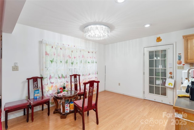 98 Choga Rdg, Whittier, NC 28789 - dining area with light wood-style floors, a chandelier, and recessed lighting