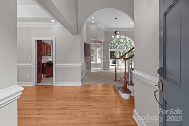 165 Futrell Lndg, New London, NC 28127 - entrance foyer featuring arched walkways, ceiling fan, crown molding, recessed lighting, and light wood finished floors