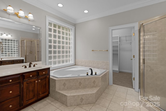 165 Futrell Lndg, New London, NC 28127 - full bathroom with a stall shower, tile patterned flooring, vanity, a walk in closet, and a bath