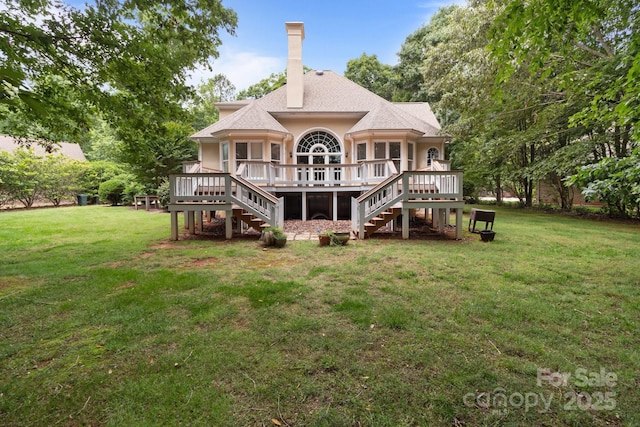 165 Futrell Lndg, New London, NC 28127 - rear view of house with stairway, a wooden deck, a lawn, and a chimney