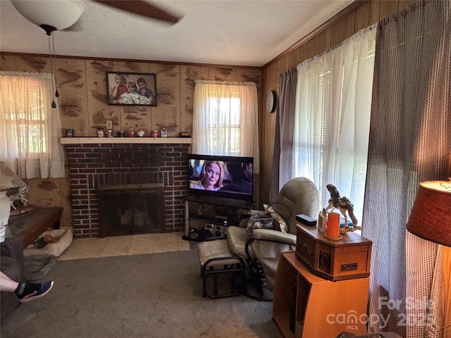 4059 10th Avenue Dr SW, Hickory, NC 28602 - living area with carpet, a brick fireplace, and wood walls