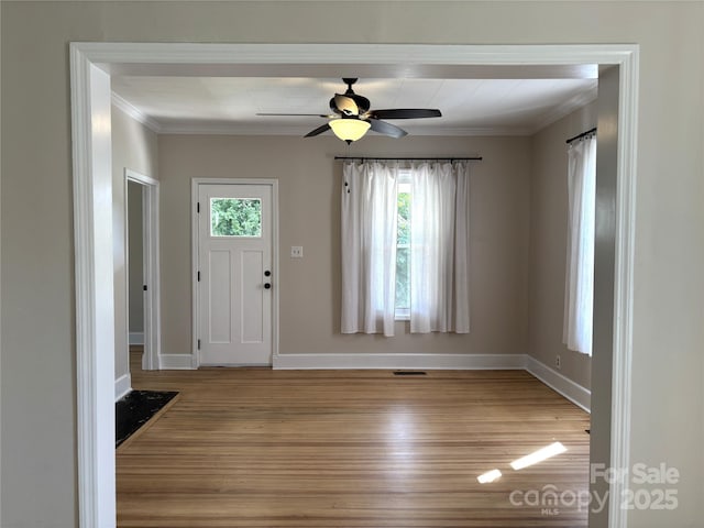 339 Mayflower Ave, Cramerton, NC 28032 - entryway featuring wood finished floors, plenty of natural light, ceiling fan, and ornamental molding