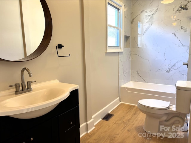 339 Mayflower Ave, Cramerton, NC 28032 - bathroom featuring vanity, wood finished floors, and shower / bathtub combination