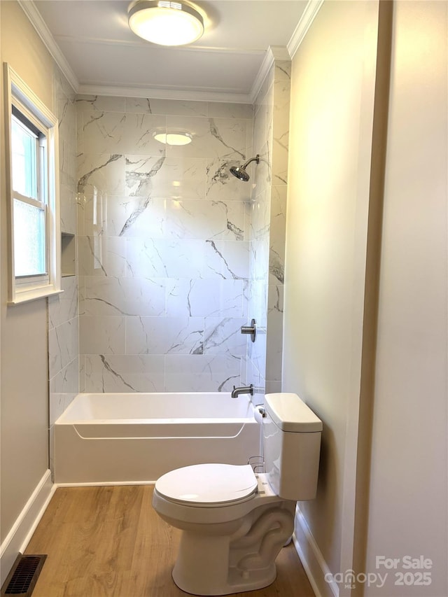 339 Mayflower Ave, Cramerton, NC 28032 - bathroom featuring ornamental molding, shower / bath combination, and wood finished floors